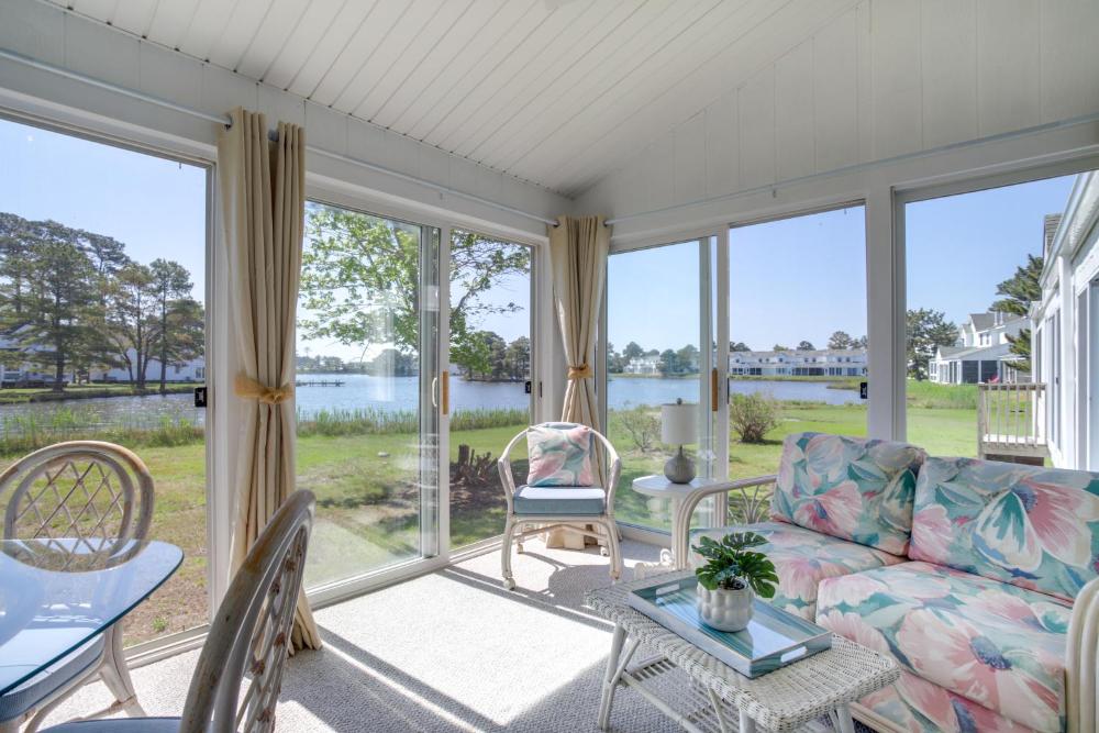Porch and Water Views Getaway in Mallard Lakes